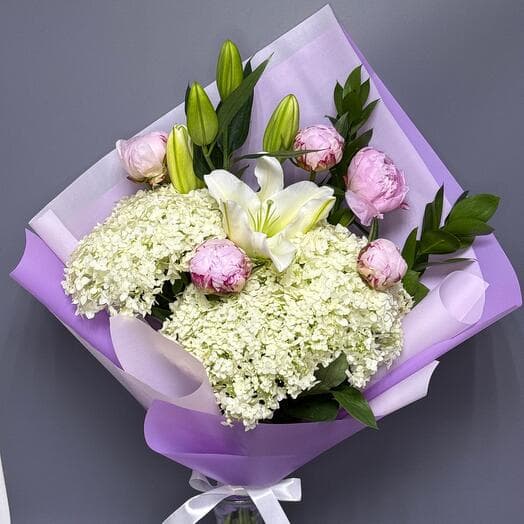Peonies, a bouquet of peonies, white lily and hydrangea