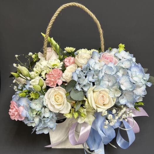 Delicate composition of hydrangea and roses