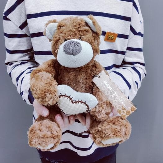 Toy soft bear with heart