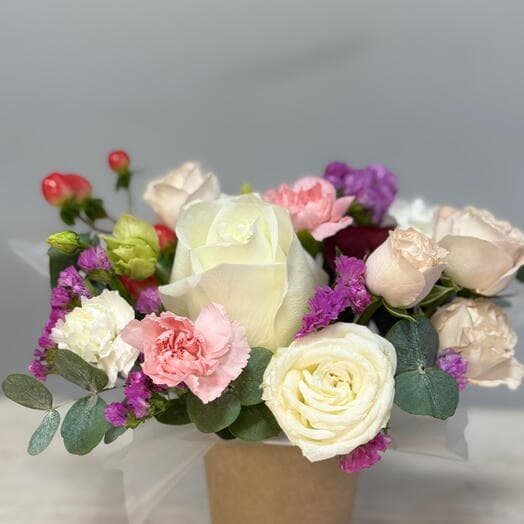 Mini bouquet compliment in a glass