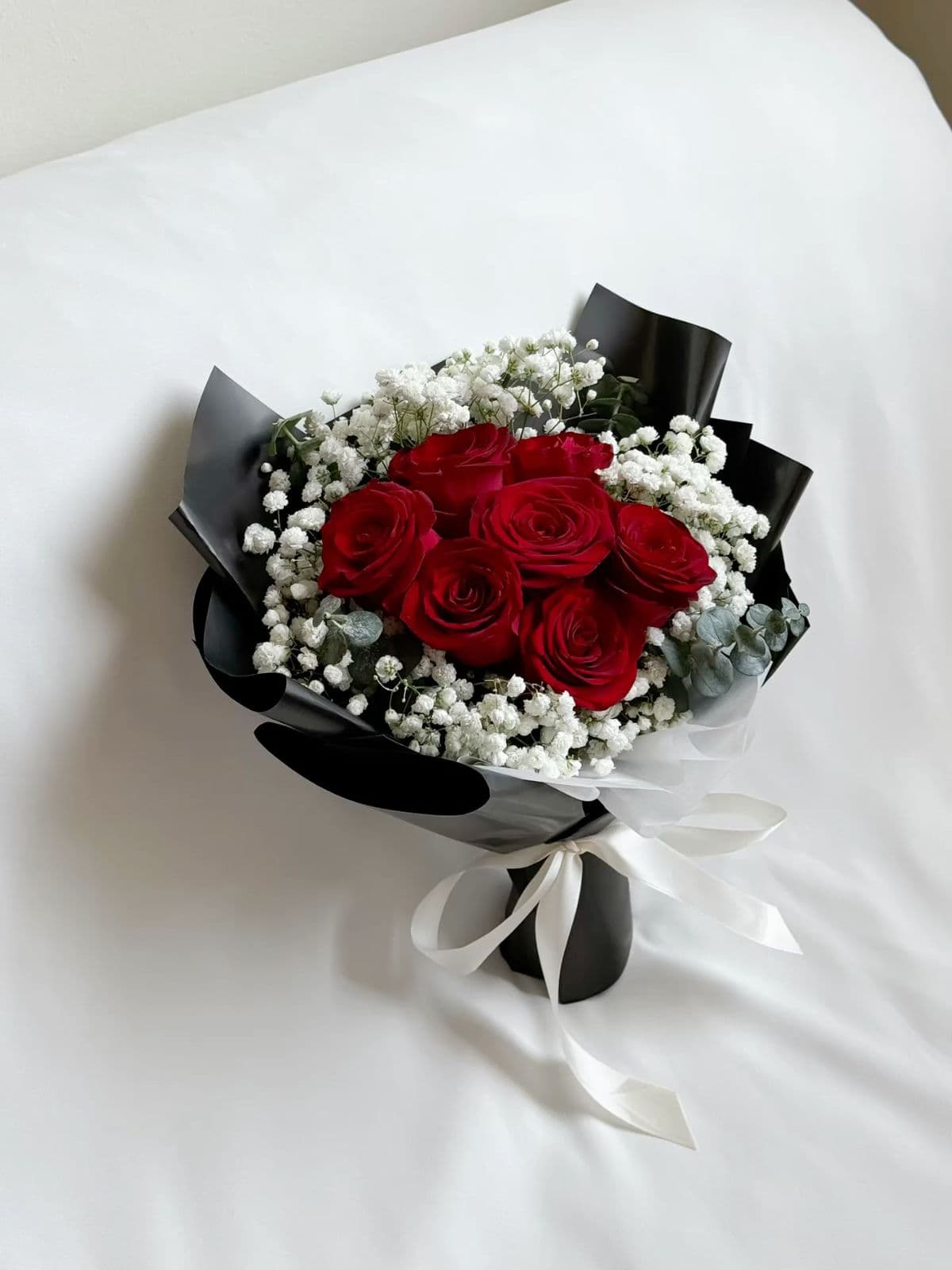 7 красных роз