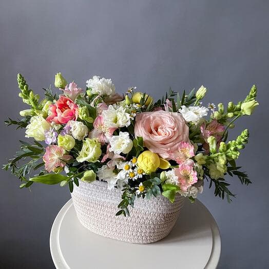 Lush basket with spring flowers