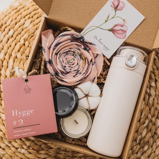 Gift set with a thermos, a handkerchief and a candle for a birthday