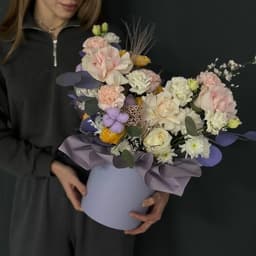 Flowers in a box with French roses0