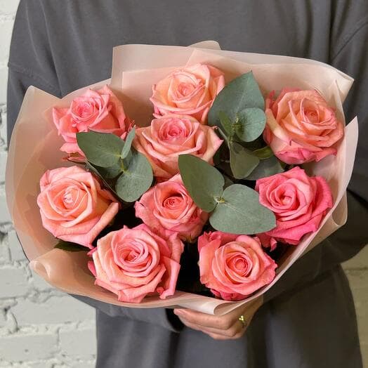 Fragrant roses with eucalyptus in design packaging
