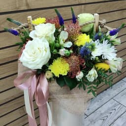 Exotic flowers in a wooden box0