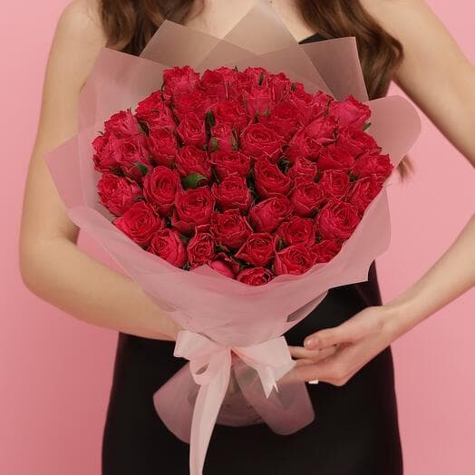 A beautiful bouquet of 51 raspberry-red rose