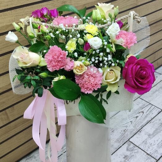 Flower composition in a wooden box