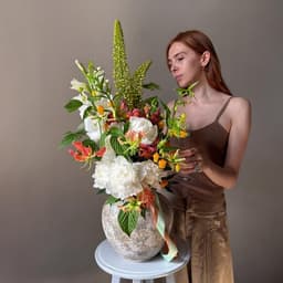Interior bouquet with exotic colors and peonies0