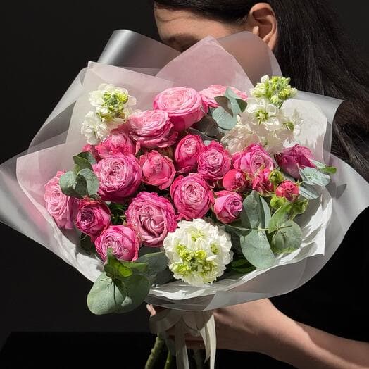 Bouquet with pionivate bush rose mattiols and eucalyptus