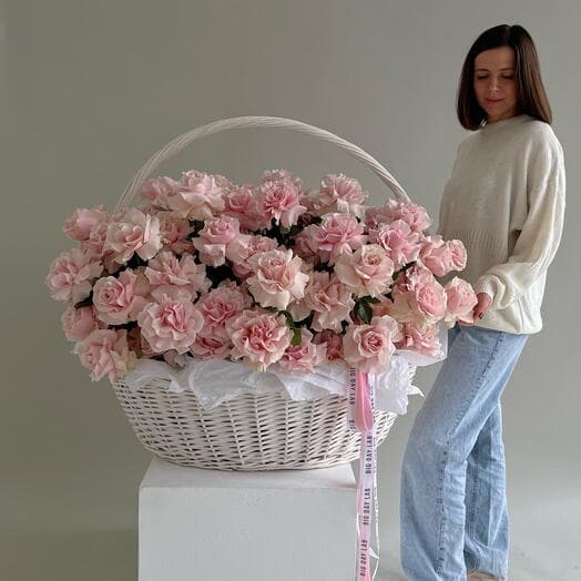 A huge basket of French roses in a delicate pink shade