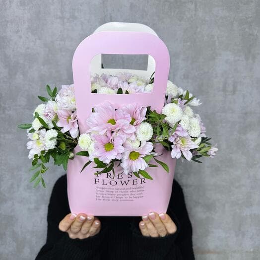 Chrysanthemum with greens in a purse
