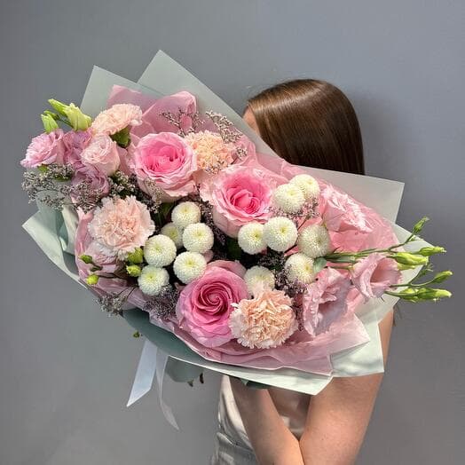 Eustoma and roses in the bouquet