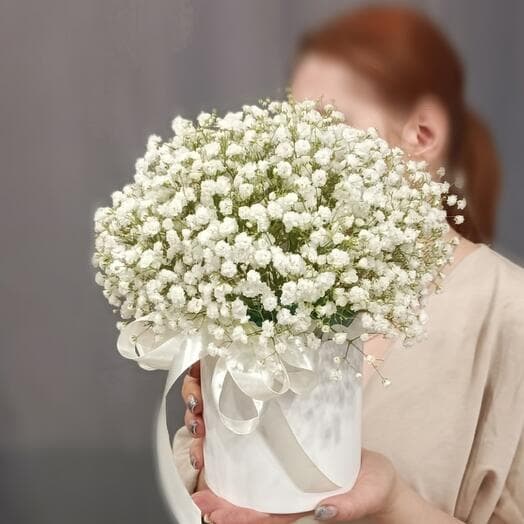 Box with white gypsophila