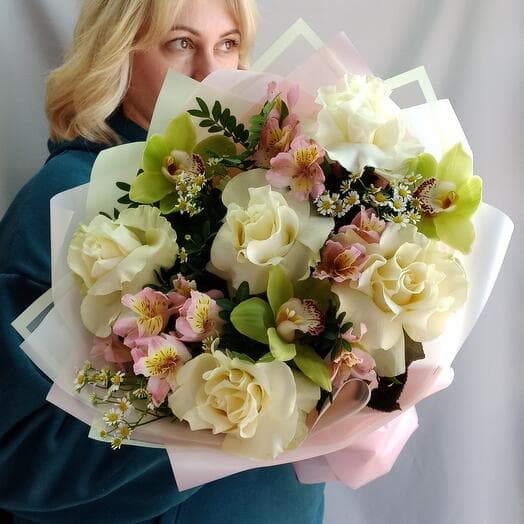 Author's bouquet with roses and orchids in stylish packaging