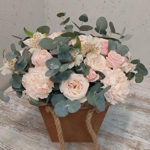 Flower composition in a wooden box