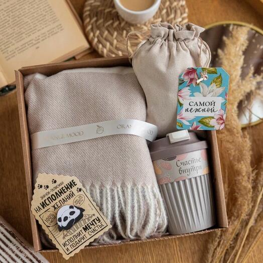 A gift "The most tender" with tea in a bag, a palactin and a talisman