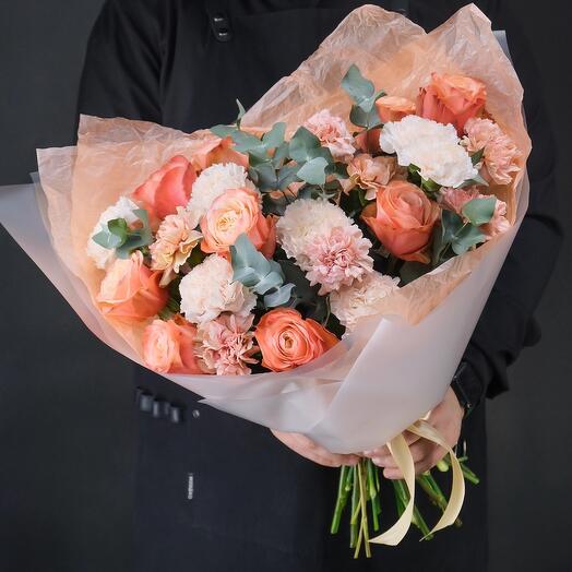 A lush bouquet with peach pionoid roses of Kahala, Dianthus and Eucalyptus AB187