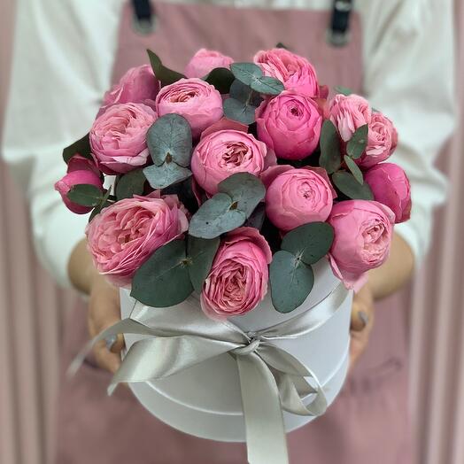 Flowers in the box. Bush roses Silva Pink and eucalyptus (m)