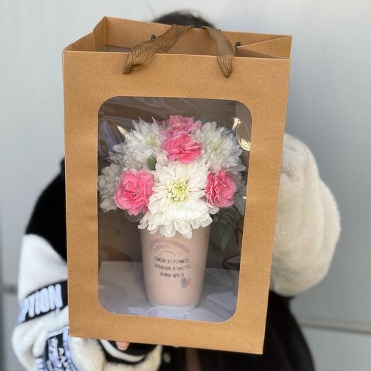 Flower compliment in a gift package