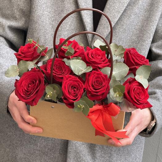 Rose with eucalyptus in a purse