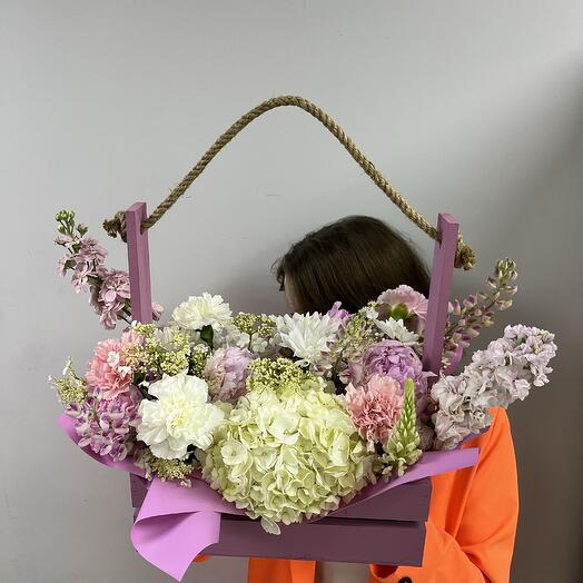 Gorgeous composition in a box of beautiful hydrangea and aromatic exotic