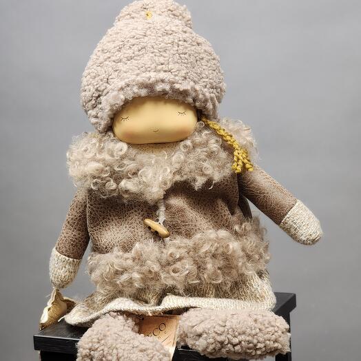 Collectible toy girl in a coat