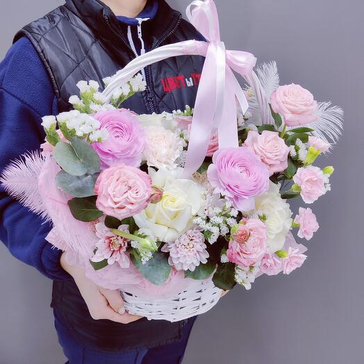 Basket with premium flowers with peonies, French rose, pionivate bush rose