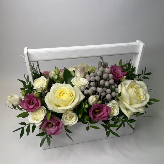 Flowers in a wooden white box with a white rose and pink east