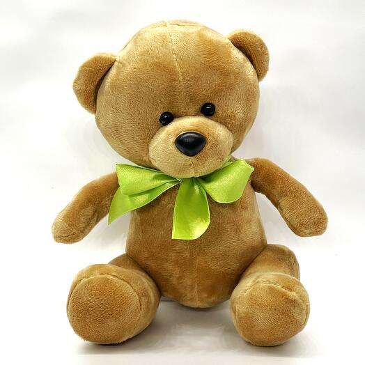 Bear Toptyzhkin Salatov with a bow