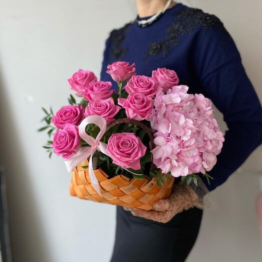 Aqua roses and hydrangea in the basket