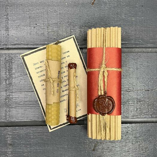 A mysterious gift: a candle to make a desire and a scroll with a prediction