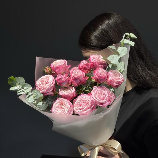 Bouquet of bush pink pionoid rose and eucalyptus