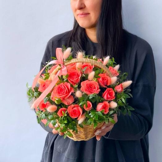 Flower basket with a bush rose and dried flowers
