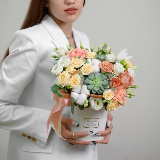 Composition in a box with cinnamon