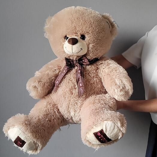 Светло-бежевый мишка с бантом