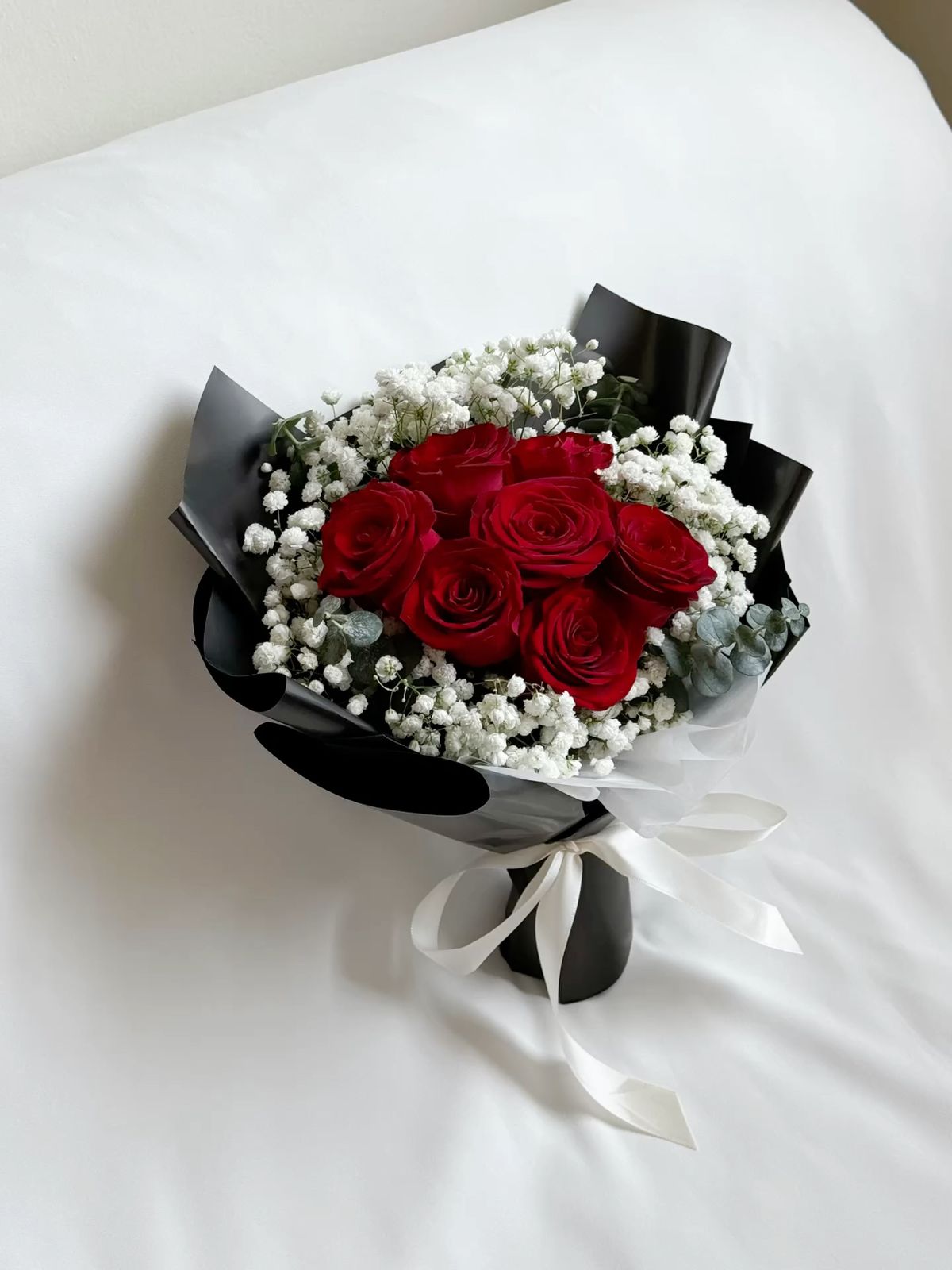 7 красных роз