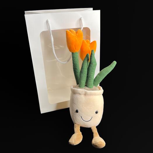 Soft toy in a gift bag Flower in a pot of tulip orange