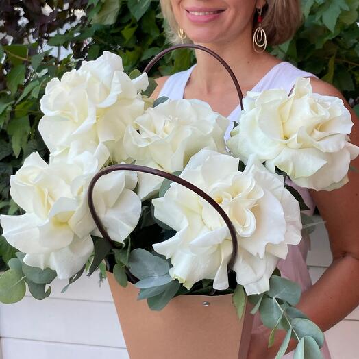 French pionivate roses in a box