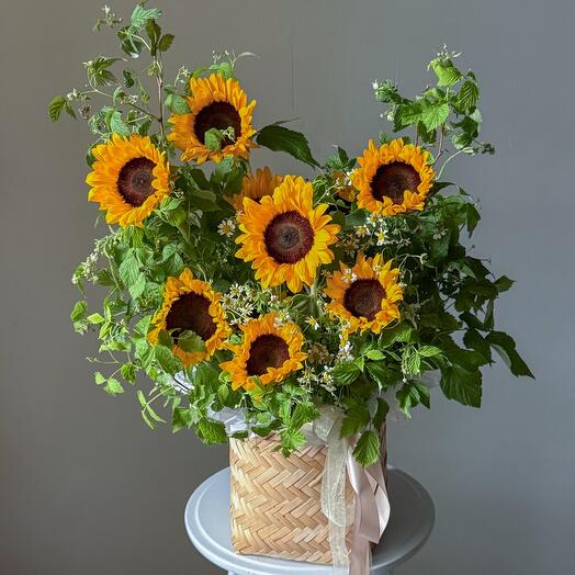 Sunflower basket, raspberries and daisies