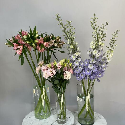 A set of flowers for home and office with vases