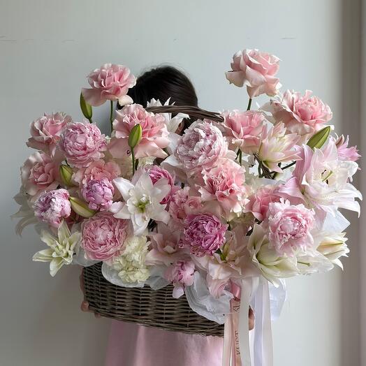 Tender WoW composition in a basket with peonies and lilies of the Sarah Bernard variety, French roses Pink Mondial and air hydenzery