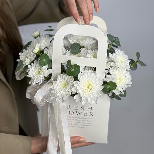 Chrysanthemum and eucalyptus in a purse