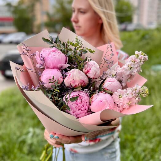 Bouquet of fresh peonies of Sarah Bernard and fragrant mattiola