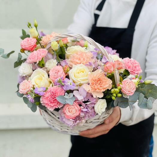 The prefabricated basket. Flowers in the basket