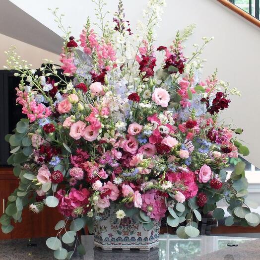 Luxurious basket of wildflowers and peonies