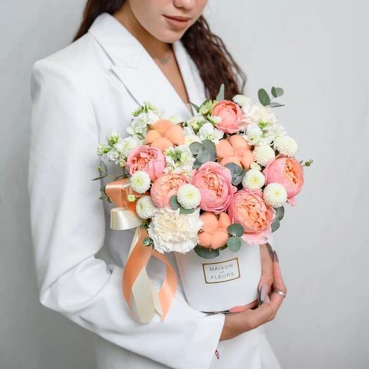 Composition in a box with a bush rose Juliet
