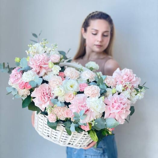 Flowers basket in delicate colors with French roses
