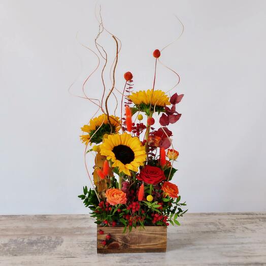 The composition with sunflowers in the box "Colorful still life"