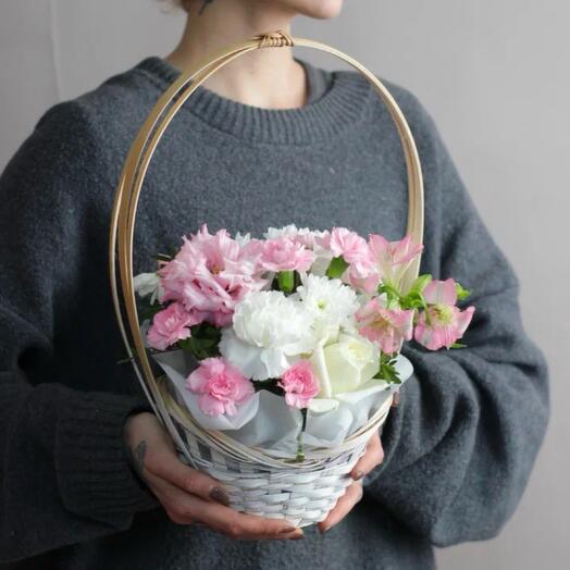 Basket with roses, alstromeria, chrysanthemums, east